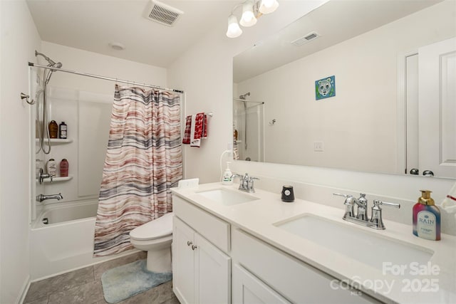 full bathroom with shower / tub combo with curtain, visible vents, and a sink