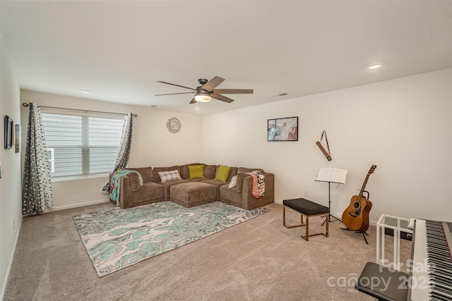 carpeted living room with recessed lighting, visible vents, baseboards, and ceiling fan