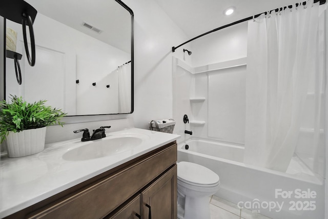 bathroom with visible vents, toilet, shower / bath combo with shower curtain, vanity, and tile patterned floors