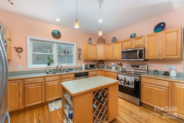 27 Hunting Lodge Dr, Black Mountain, NC 28711 - kitchen with light wood-type flooring, a sink, light countertops, and stainless steel appliances