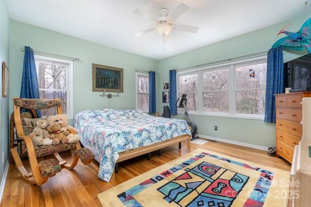 27 Hunting Lodge Dr, Black Mountain, NC 28711 - bedroom with baseboards, a ceiling fan, and wood finished floors