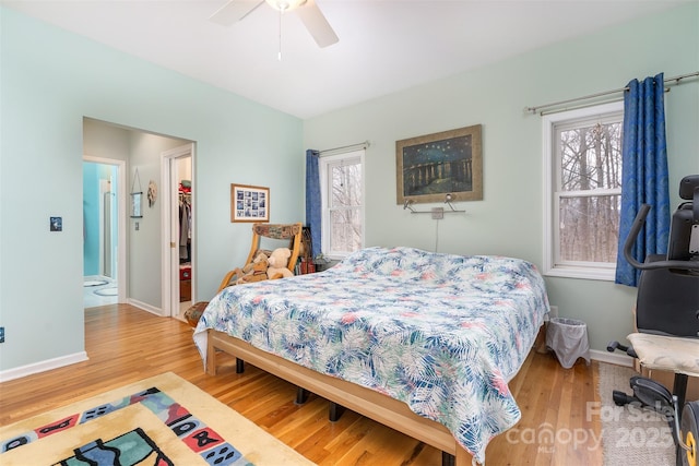 27 Hunting Lodge Dr, Black Mountain, NC 28711 - bedroom featuring baseboards, multiple windows, and wood finished floors