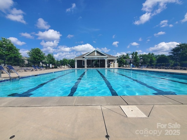 4924 Riverdale Dr, Charlotte, NC 28273 - community pool featuring fence and a patio area