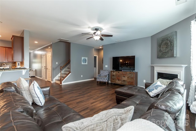 4924 Riverdale Dr, Charlotte, NC 28273 - living room featuring dark wood-style flooring, baseboards, recessed lighting, a ceiling fan, and stairs
