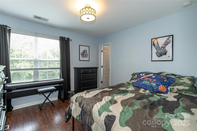 4924 Riverdale Dr, Charlotte, NC 28273 - bedroom with wood finished floors and visible vents