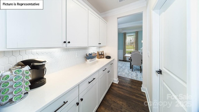 152 Ventor Way, Mooresville, NC 28115 - bar with ornamental molding, decorative backsplash, and dark wood-type flooring