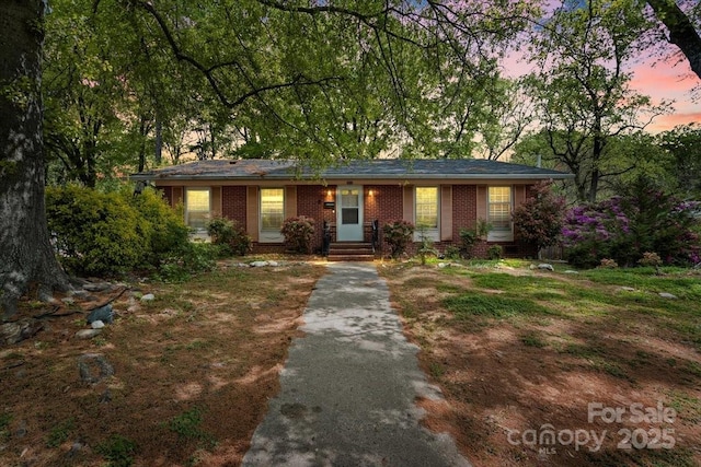 3612 Winterfield Pl, Charlotte, NC 28205 - ranch-style home with brick siding and driveway