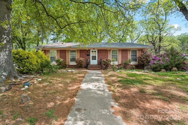 3612 Winterfield Pl, Charlotte, NC 28205 - ranch-style house with brick siding and driveway