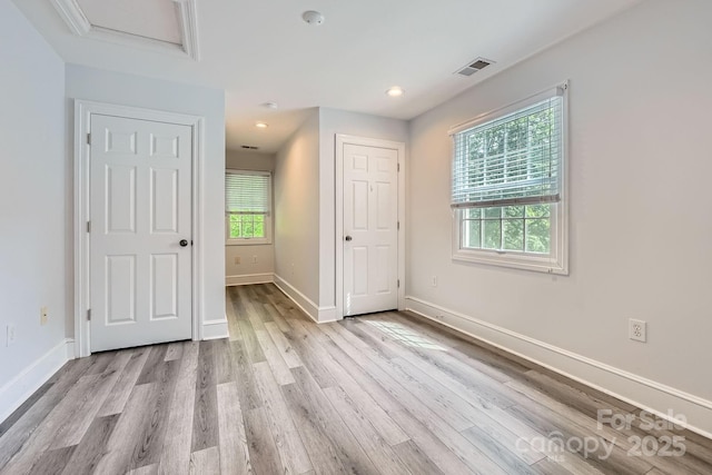 119 Taylor Ct, Mooresville, NC 28117 - unfurnished bedroom with attic access, recessed lighting, baseboards, wood finished floors, and visible vents