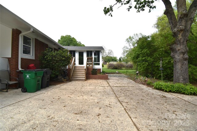 exterior space with a sunroom