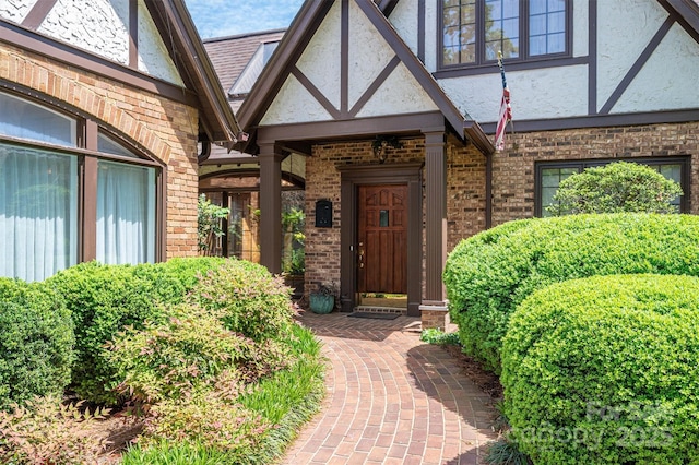 418 3rd St NE, Hickory, NC 28601 - view of exterior entry with brick siding and stucco siding