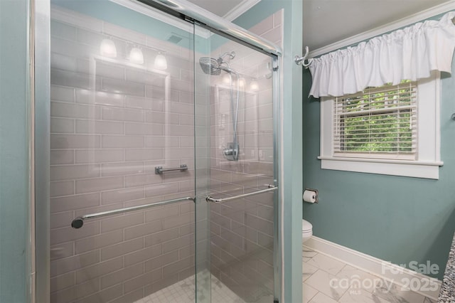 418 3rd St NE, Hickory, NC 28601 - bathroom with toilet, a stall shower, marble finish floor, baseboards, and ornamental molding
