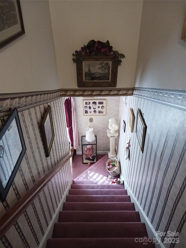 160 17th Street Pl NW Unit 3E, Hickory, NC 28601 - stairway with carpet floors and a wainscoted wall