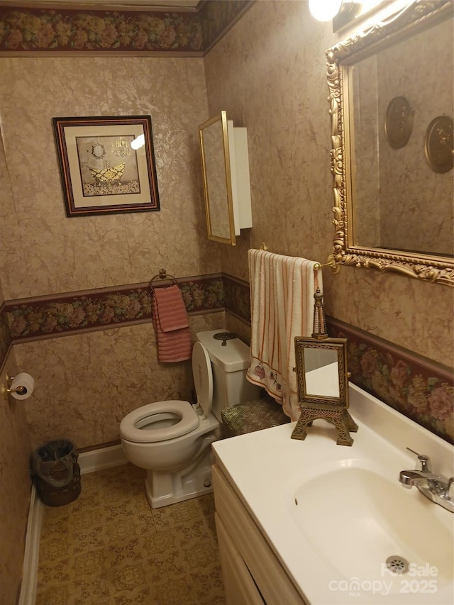 160 17th Street Pl NW Unit 3E, Hickory, NC 28601 - bathroom featuring vanity, toilet, and wallpapered walls