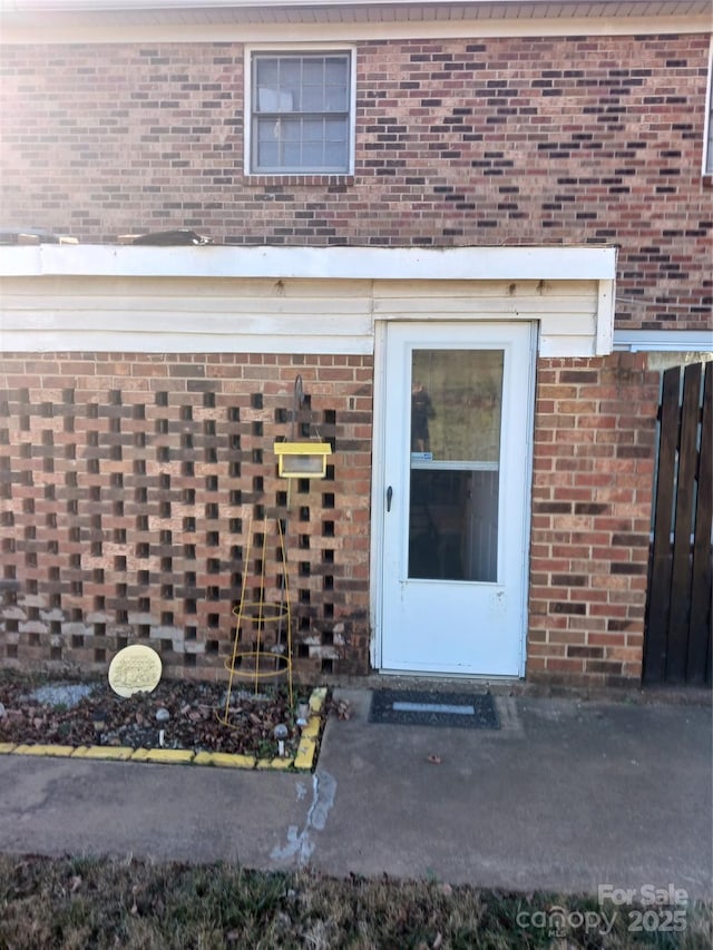 160 17th Street Pl NW Unit 3E, Hickory, NC 28601 - doorway to property with brick siding