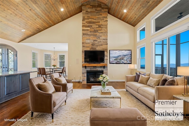 179 Serenity Ridge Trl, Asheville, NC 28804 - living area with high vaulted ceiling, wood finished floors, recessed lighting, wooden ceiling, and a fireplace