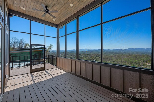 179 Serenity Ridge Trl, Asheville, NC 28804 - unfurnished sunroom with a mountain view and ceiling fan