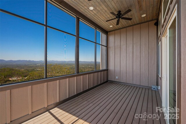 179 Serenity Ridge Trl, Asheville, NC 28804 - unfurnished sunroom with a mountain view and ceiling fan