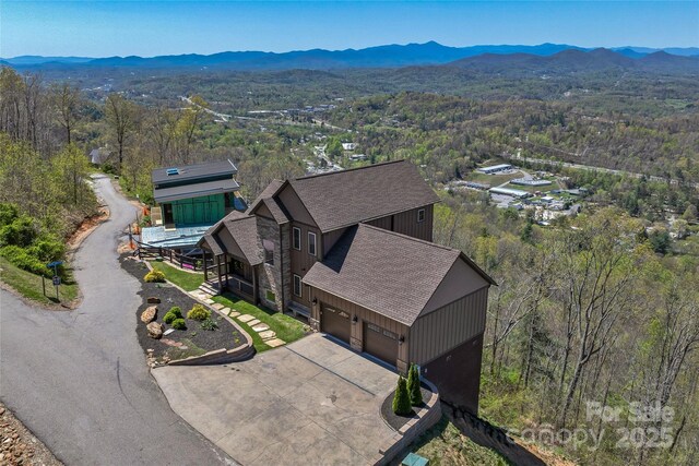 179 Serenity Ridge Trl, Asheville, NC 28804 - view of subject property featuring mountains and a heavily wooded area