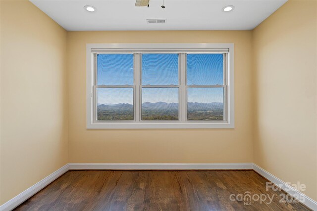 179 Serenity Ridge Trl, Asheville, NC 28804 - empty room with baseboards, healthy amount of natural light, dark wood-style floors, and recessed lighting