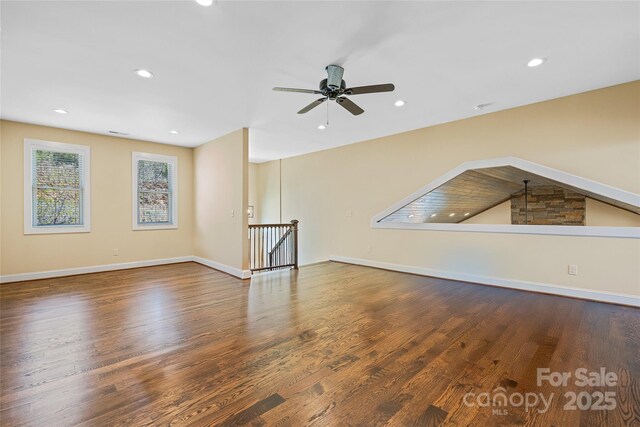 179 Serenity Ridge Trl, Asheville, NC 28804 - spare room with a ceiling fan, wood finished floors, recessed lighting, and baseboards