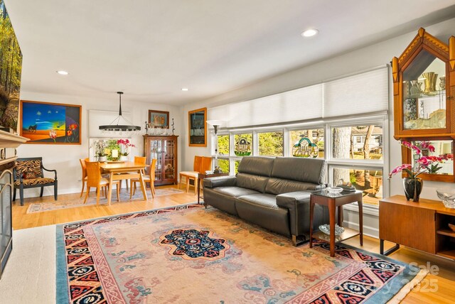2 Bevlyn Dr, Asheville, NC 28803 - living area featuring baseboards, wood finished floors, and recessed lighting