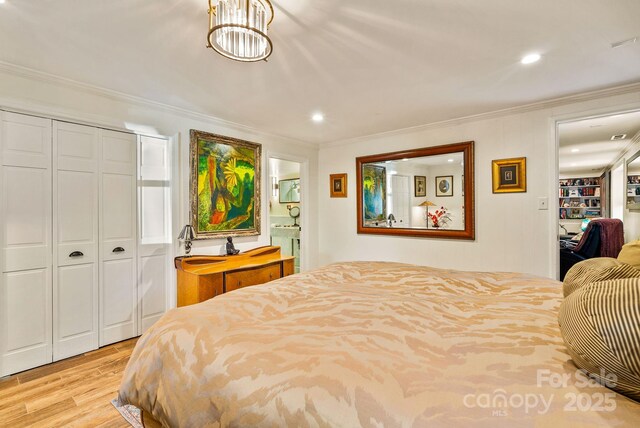 2 Bevlyn Dr, Asheville, NC 28803 - bedroom featuring light wood finished floors, recessed lighting, a closet, and ornamental molding