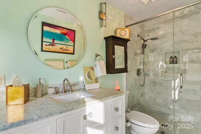 2 Bevlyn Dr, Asheville, NC 28803 - full bathroom featuring a shower stall, toilet, and vanity