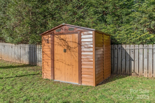 2 Bevlyn Dr, Asheville, NC 28803 - view of shed with a fenced backyard