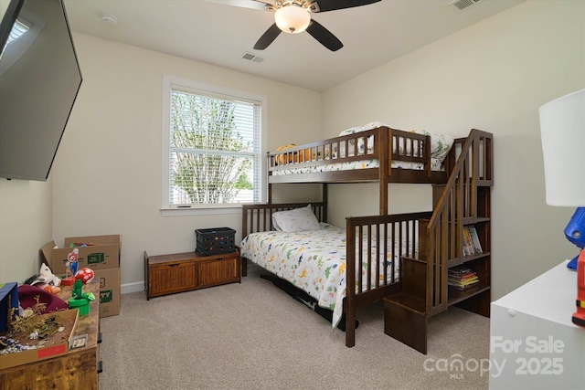 carpeted bedroom with visible vents