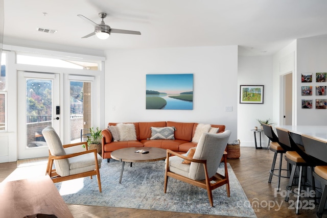 55 S Market St Unit 101, Asheville, NC 28801 - living area with dark wood-type flooring, visible vents, and a ceiling fan