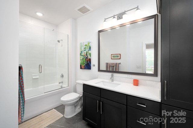 55 S Market St Unit 101, Asheville, NC 28801 - full bath featuring shower / bath combination with glass door, vanity, visible vents, and toilet