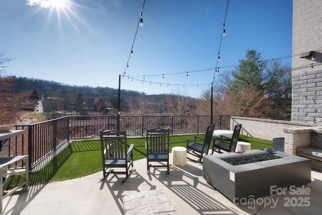 55 S Market St Unit 101, Asheville, NC 28801 - view of patio / terrace with a fire pit and a balcony