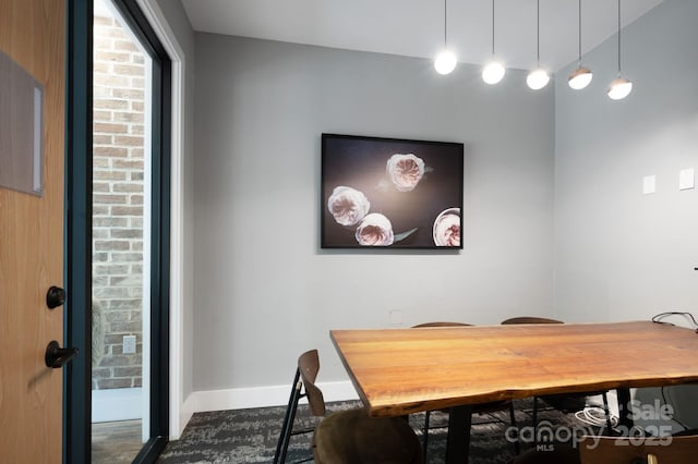 55 S Market St Unit 101, Asheville, NC 28801 - dining space featuring baseboards