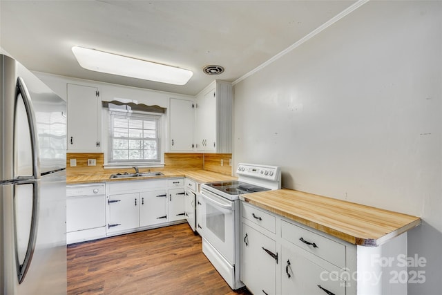 764 Emorywood Ln, Rock Hill, SC 29730 - kitchen with white cabinets, a sink, ornamental molding, white appliances, and dark wood finished floors