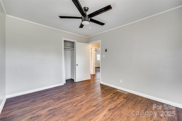 764 Emorywood Ln, Rock Hill, SC 29730 - unfurnished bedroom featuring crown molding, a closet, visible vents, wood finished floors, and baseboards