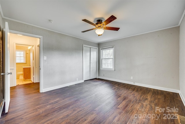 764 Emorywood Ln, Rock Hill, SC 29730 - unfurnished bedroom with crown molding, ceiling fan, dark wood-type flooring, a closet, and baseboards