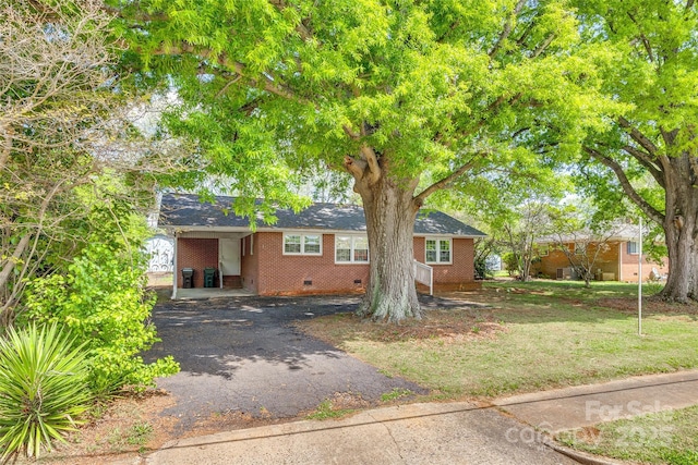 764 Emorywood Ln, Rock Hill, SC 29730 - single story home with aphalt driveway, crawl space, a carport, a front yard, and brick siding