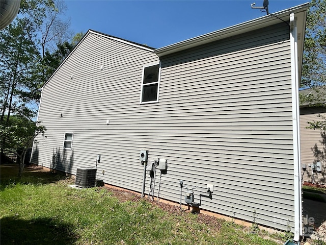 2752 Bramble Ridge Ct, Charlotte, NC 28215 - view of property exterior featuring cooling unit and a lawn