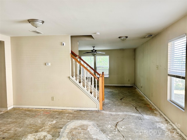 2752 Bramble Ridge Ct, Charlotte, NC 28215 - spare room with ceiling fan, baseboards, visible vents, and stairs