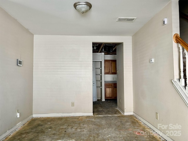 2752 Bramble Ridge Ct, Charlotte, NC 28215 - empty room featuring concrete floors, visible vents, and baseboards