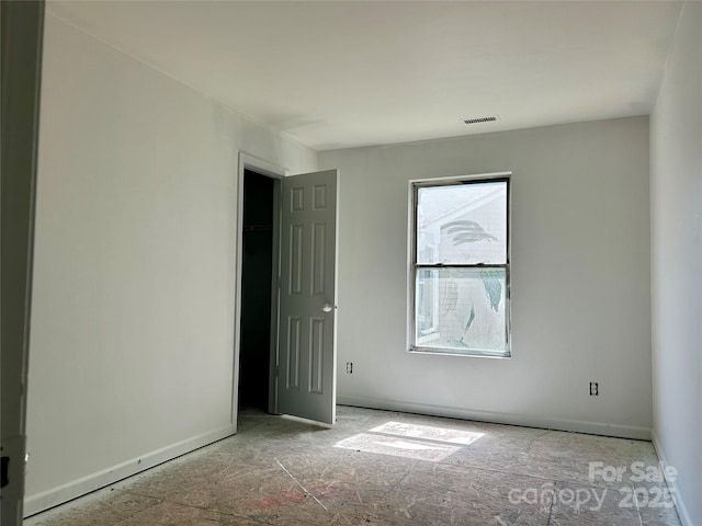 2752 Bramble Ridge Ct, Charlotte, NC 28215 - unfurnished room with baseboards and visible vents