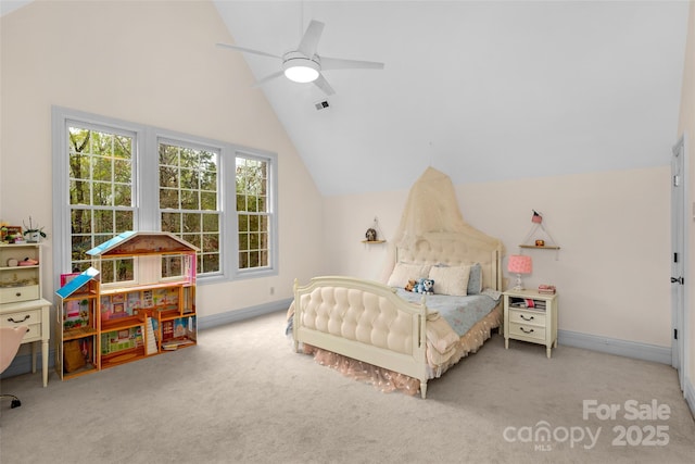 bedroom featuring baseboards, visible vents, carpet flooring, and vaulted ceiling