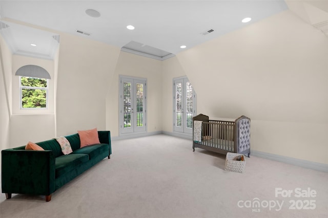 carpeted bedroom with multiple windows, visible vents, and baseboards