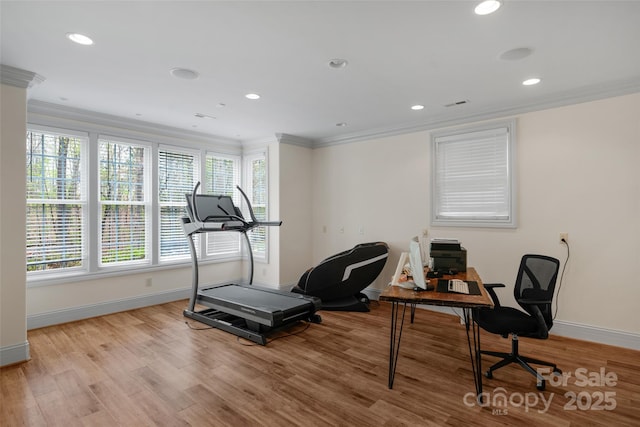 workout room featuring baseboards, light wood-type flooring, crown molding, and recessed lighting
