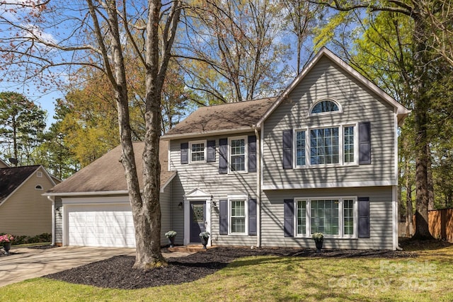 2439 Heathershire Ln, Matthews, NC 28105 - view of front of property featuring a garage and concrete driveway
