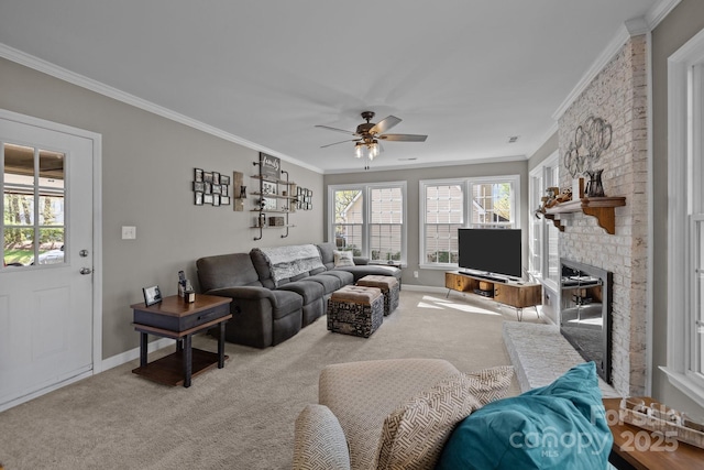 2439 Heathershire Ln, Matthews, NC 28105 - carpeted living room featuring ornamental molding, baseboards, ceiling fan, and a fireplace
