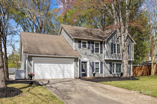 2439 Heathershire Ln, Matthews, NC 28105 - view of front of house with a garage and driveway