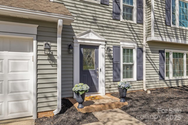 2439 Heathershire Ln, Matthews, NC 28105 - entrance to property with an attached garage