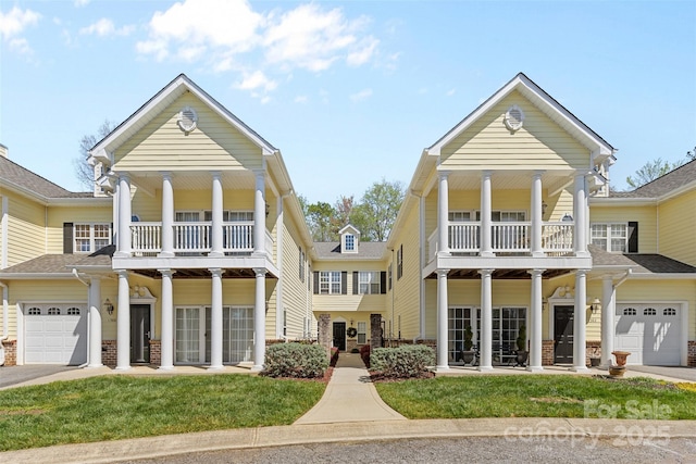 1386 21st Ave NE, Hickory, NC 28601 - view of front of house with a balcony, driveway, and a garage